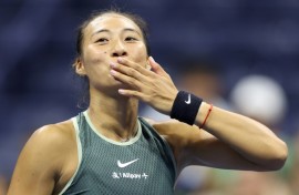 Queen of the night: Zheng Qinwen celebrates her win over Donna Vekic 