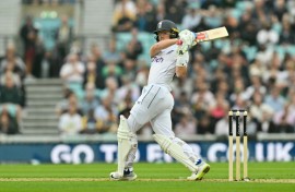 On the attack: England captain Ollie Pope hits a six off Lahiru Kumara in the third Test at the Oval