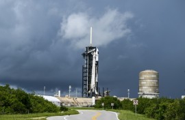 A SpaceX Falcon 9 rocket with the Crew Dragon Resilience capsule sits on Launch Complex 39A at Kennedy Space Center ahead of the Polaris Dawn Mission in Cape Canaveral, Florida