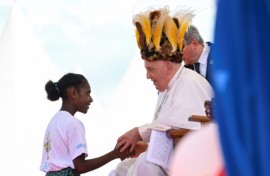 The pope's Asia-Pacific tour included a stop in Papua New Guinea, where he donned a traditional headdress