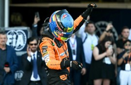 McLaren's Oscar Piastri celebrates his thrilling win over Charles Leclerc in Baku 
