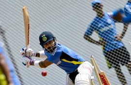 India's Virat Kohli bats in the nets during a practice session in Chennai ahead of their first Test against Bangladesh