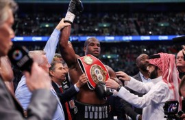 Britain's Daniel Dubois celebrates after defeating compatriot Anthony Joshua at Wembley to retain his IBF world heavyweight title