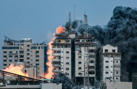 October 7, 2023: a ball of fire and smoke after an Israeli air strike hits the Palestine Tower in Gaza City