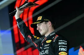See you?: Max Verstappen on the podium after the Singapore Grand Prix