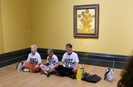 Three climate activists were detained after throwing soup on two Vincent van Gogh paintings in London