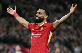 Liverpool's Mohamed Salah celebrates scoring against Bologna