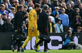 Liverpool goalkeeper Alisson Becker limped off late on