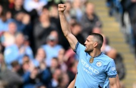 Manchester City midfielder Mateo Kovacic celebrates after scoring against Fulham