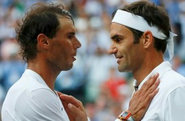 'Unforgettable memories' - Roger Federer (R) and Rafael Nadal (L) after the Swiss legend won their semi-final match at Wimbledon in July 2019