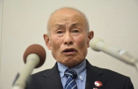 A grassroots group of survivors formed after the 1945 atomic bombings in Japan reacted with tears and dire warnings on Friday after winning the Nobel Peace Prize