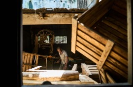 The coffin workshop in downtown Beira has a disused sawmill