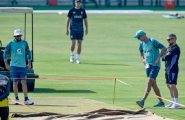 Head coaches Brendon McCullum and Jason Gillespie inspect the Multan pitch condemned as "a road" during the first Test between England and Pkaistan