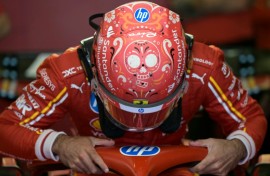 Ferrari's Spanish driver Carlos Sainz boards his car during the second practice session for the Formula One Mexico City Grand Prix