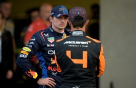 Red Bull Racing's Dutch driver Max Verstappen (L) talks with McLaren's British driver Lando Norris after qualifying for the Mexico Grand Prix