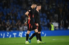 Barcelona's Robert Lewandowski (L) picked up a lower back injury in the La Liga defeat at Real Sociedad