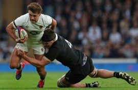 England's Henry Slade in action against New Zealand