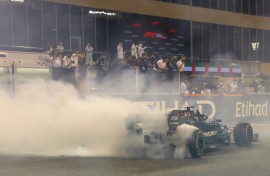Lewis Hamilton does doughnuts after the Covid-19 affected season closer in Abu Dhabi - his seventh world title