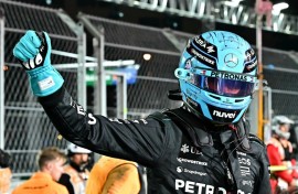 Fast show: Mercedes' George Russell celebrates securing pole position 