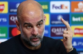 Manchester City manager Pep Guardiola speaks to the press ahead of his team's match against Feyenoord