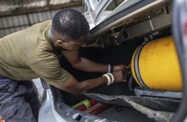 Faced with soaring petrol prices after an end to fuel subsidies, some Nigerians are convertng their cars to run on compressed natural gas