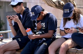 Students look at their phones in Australia, where the government has passed a law banning social media for those under 16