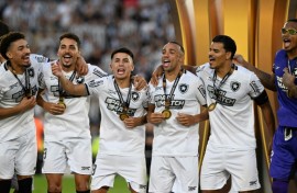 Botafogo players celebrate after winning the Copa Libertadores final over fellow Brazilian club Atletico Mineiro