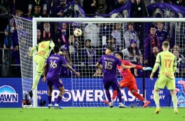 Andres Reyes heads in the winner as the New York Red Bulls beat Orlando City to reach the MLS Cup final.