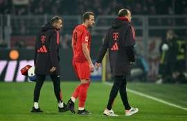 Bayern Munich's English forward Harry Kane (C) suffered a hamstring injury during Saturday's 1-1 Bundesliga draw at Borussia Dortmund