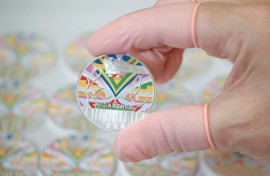 The coin's design includes the psychedelic 'magic piano' featured in the 1967 Magical Mystery Tour film