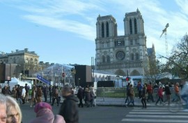 Onlookers flock to Notre-Dame Cathedral on eve of reopening