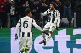 Weston McKennie (R) celebrates after scoring to give Juventus a 2-0 lead against Manchester City in Turin