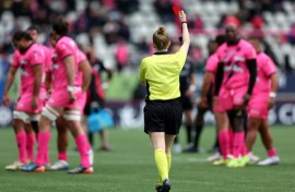Scottish referee Hollie Davidson brandishes a red card at Sekou Macalou of Stade Francais