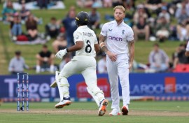 England’s Ben Stokes grabs his hamstring