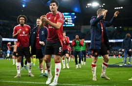 Defender Harry Maguire applauds fans after Manchester United's 2-1 win at the Etihad