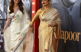 Bollywood actors Alia Bhatt (L) and Rekha at an event marking the 100th birth anniversary of legendary Indian actor and filmmaker Raj Kapoor