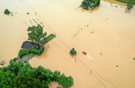 In July, heavy rains caused by Typhoon Gaemi flooded villages in China's Hunan province                
