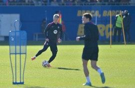 Barcelona midfielder Dani Olmo (L) is in an uncertain situation with the club not yet registering him