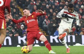 Amad Diallo (R) equalised 10 minutes from time as Manchester United earned a point at Anfield