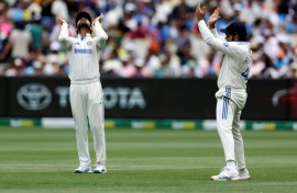 India's Virat Kohli (L) and Rohit Sharma during the fourth Test in Melbourne