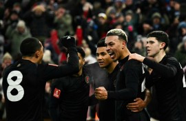 Aston Villa's Morgan Rogers (2nd R) celebrates after scoring against West Ham