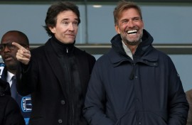 German football coach Jurgen Klopp (R) and Antoine Arnault (L) whose family have purchased a stake in French Ligue 2 club Paris FC before a match on Saturday