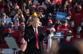 Donald Trump, shown here dancing to a Village People song as he wraps up a campaign rally at Green Bay-Austin Straubel International Airport on October 30, 2020 in Green Bay, Wisconsin