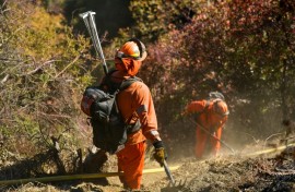 More than 900 inmates are working alongside firefighters in the battle to tame wildfires in Los Angeles