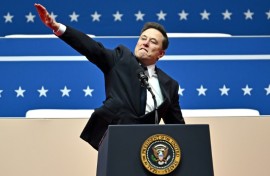 Tesla and SpaceX CEO Elon Musk gestures as he speaks during a post-inauguration celebration in Washington
