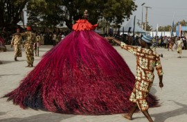 A swirling Zangbeto performs at the Voodoo Festival in Ouidah on January 10, 2025
