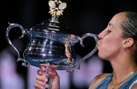 Madison Keys poses with the Daphne Akhurst Memorial Cup after her victory over Aryna Sabalenka