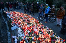 Mourners made a makeshift memorial for the victims of a knife attack in Aschaffenburg