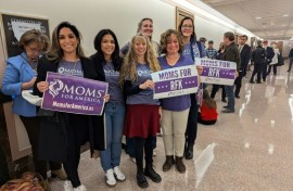 Chana Walker (3rd L) poses with members of "Moms for America" at the US Senate on Capitol Hill in Washington, DC, on January 30, 2025