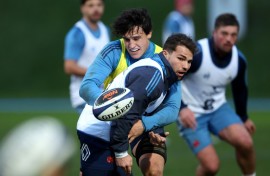 Antoine Dupont (R) made his Test deut in 2017